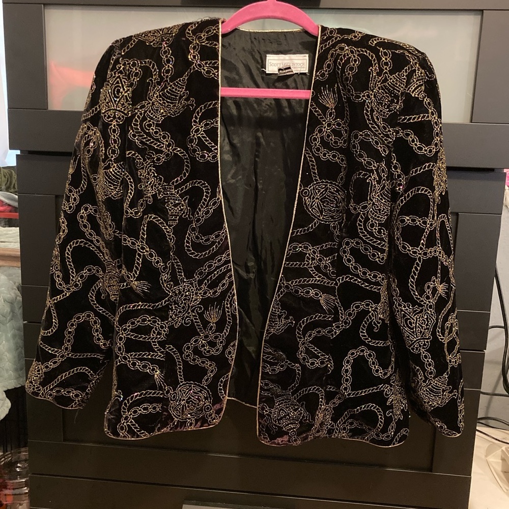 Black and gold padded shoulder jacket